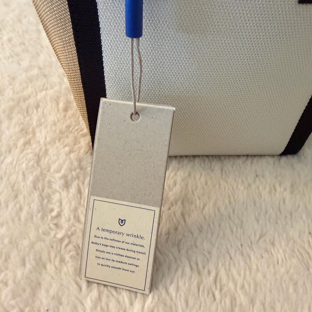 New in Box & Authentic Rothy’s The Mini Hand Bag - Piano Keys - Picture 6 of 8